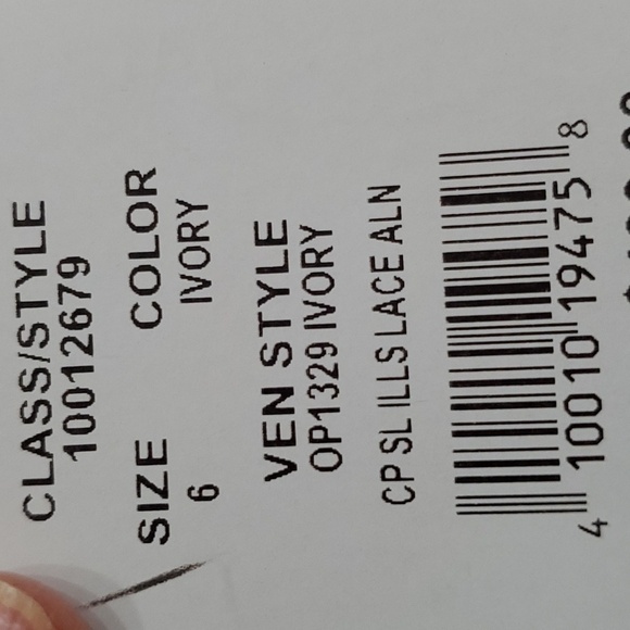 Wedding dress, David's Bridal, NWT. Size 6. Ivory lace and satin. Low V back. - Picture 12 of 16